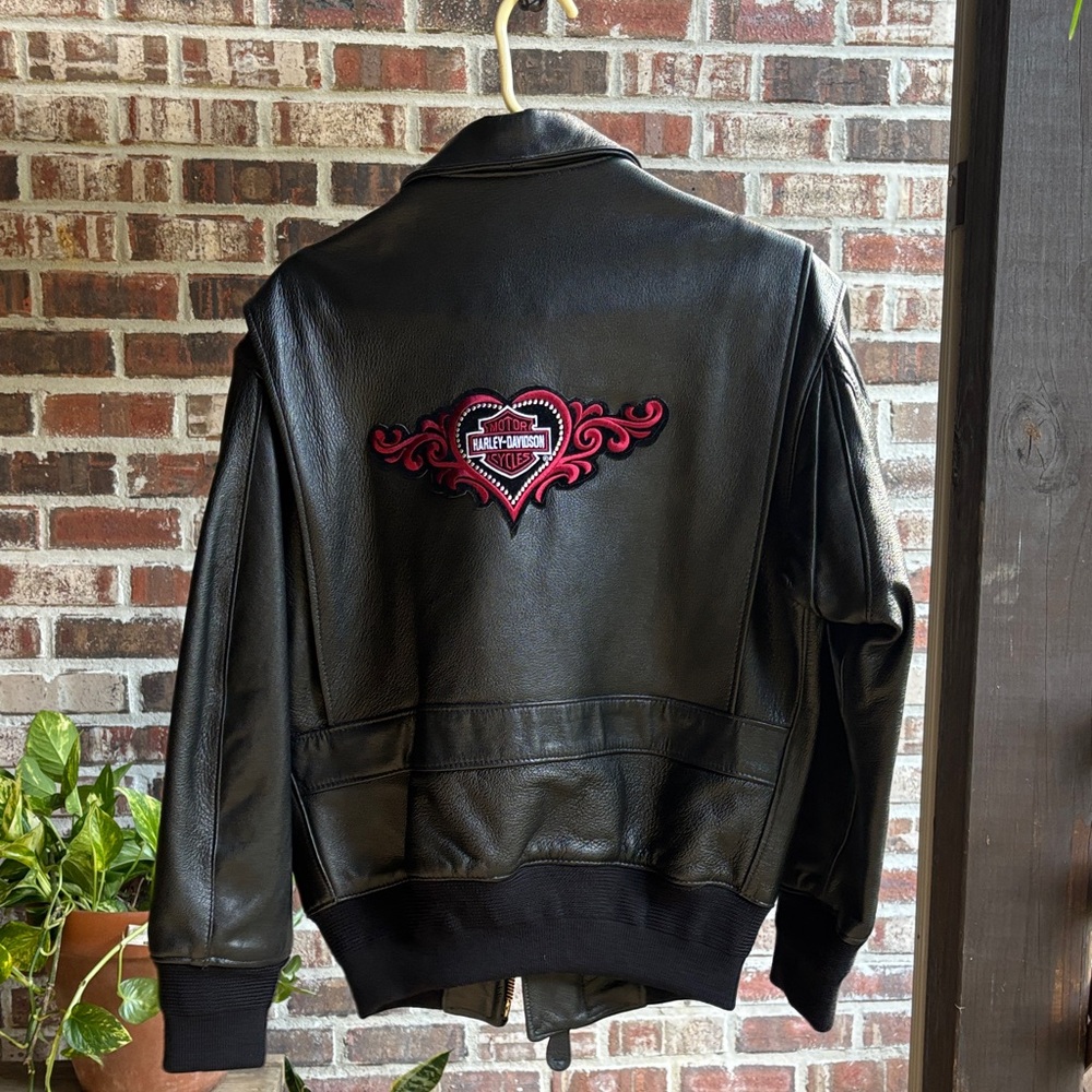 Black Leather Jacket.  I added a Red (Harley Davidson)  emblem on back.